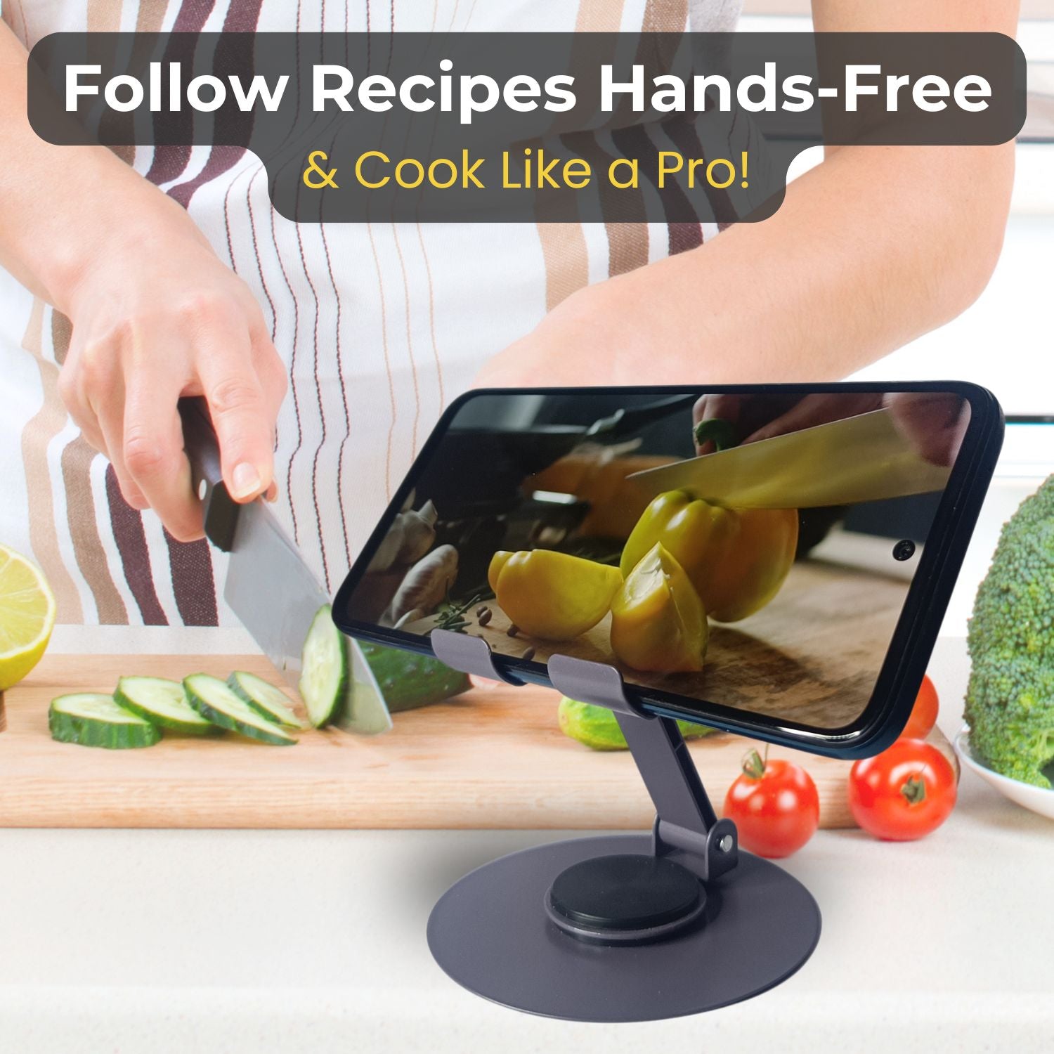 Metal mobile holder used in the kitchen for holding a smartphone while cooking and watching a recipe